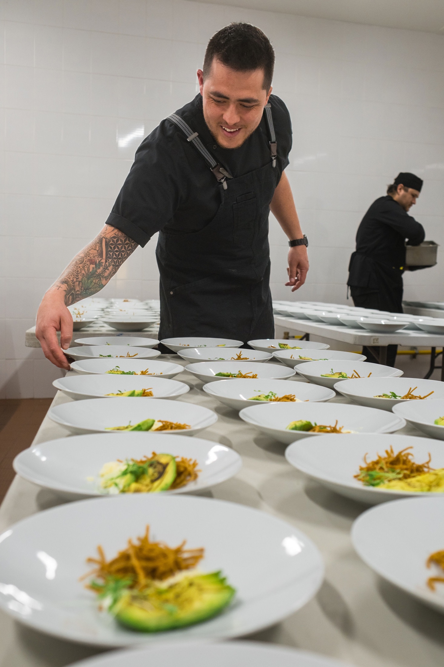 GA Catering chef preparing a large plated event